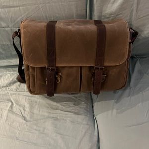 Photography bag, never used. Suede and protective waterproof covering.
